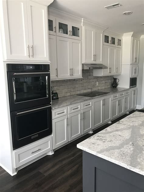 white cabinets with black stainless steel laundry|black stainless steel appliances.